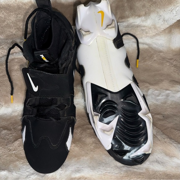 Nike Black and White Cleats with Yellow Accents